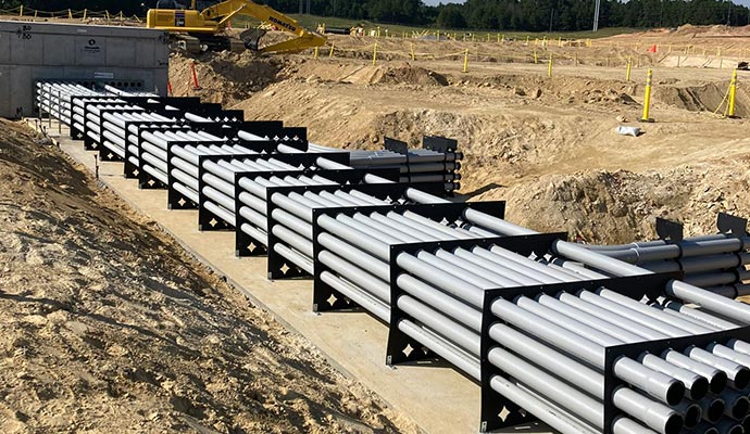 Duct bank conduit spacer installation