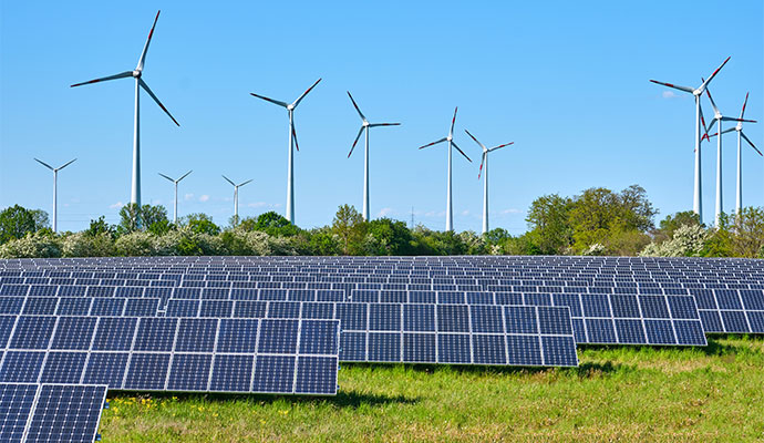 Renewable energy site with solar panels and wind turbines